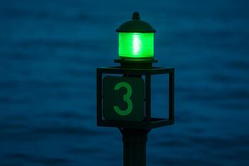 Green channel marker light with steady glow