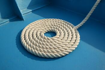 Rope coiled in a neat circle on deck