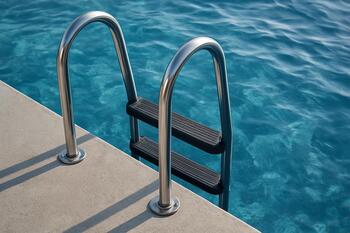 Swim ladder with rubberized steps and hand-hold grips