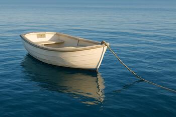 Dinghy moored with enough scope at a rising tide