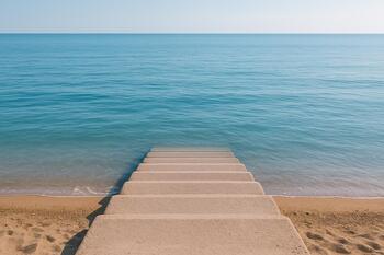 Shore steps meeting water at comfortable mid-tide height